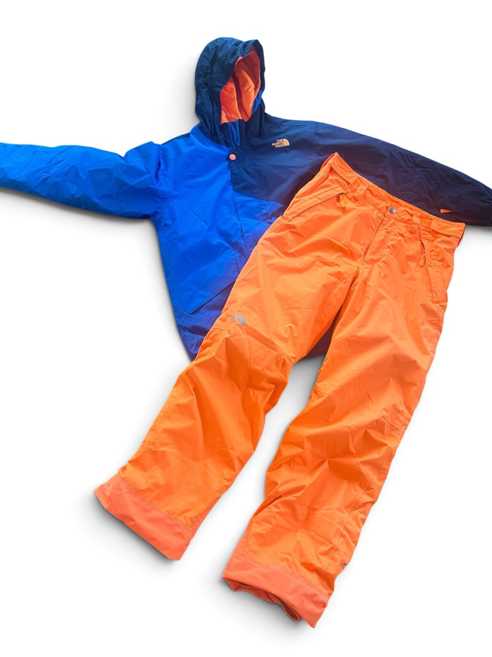 The North Face Blue Hooded Jacket with Bright Orange Snow Pants